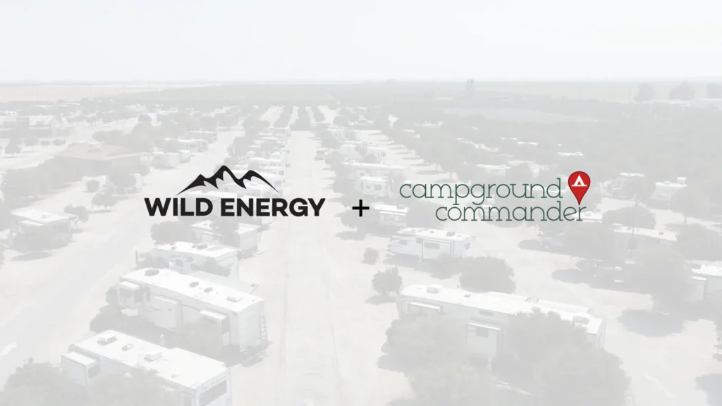 Campground Management Software Integrates with Wild Energy. The image is an RV park with Wild Energy + Campground Commander logos